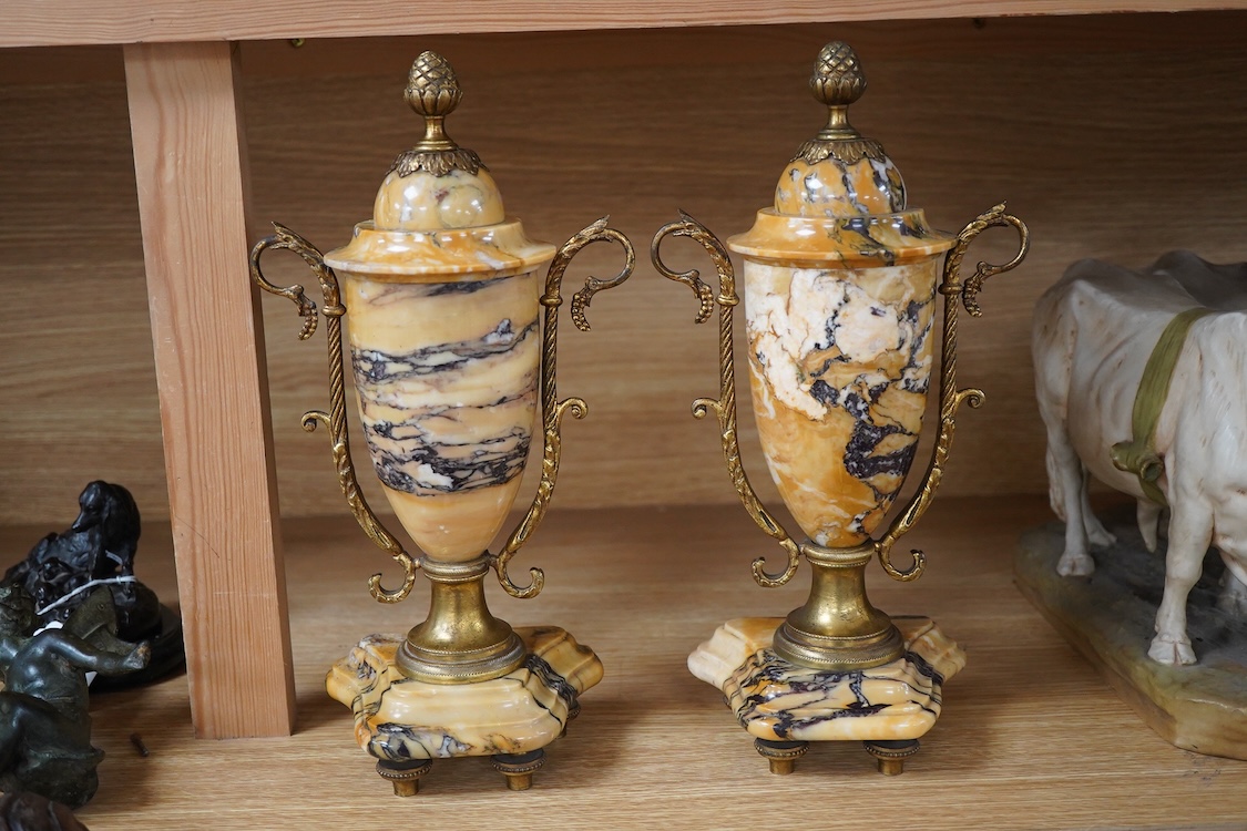 A pair of late 19th century French Sienna marble and ormolu mounted urns, 31cm high.